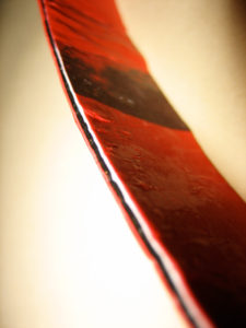 Fused plastic can be layered quite thick. This piece is about 1/4" thick.