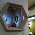 HomeGoods' octagon mirror has a handsomely sturdy frame and weathered finish. The price was also a steal!