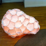 Asler Valero stapled paper plates together to create a one-of-a-kind sculptural lamp.