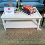 This simple white coffee table would pair nicely with sparkly acessories.