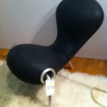 Marc Newson's squishy foam "Embryo" chair looks fun and is just as fun to sit on.